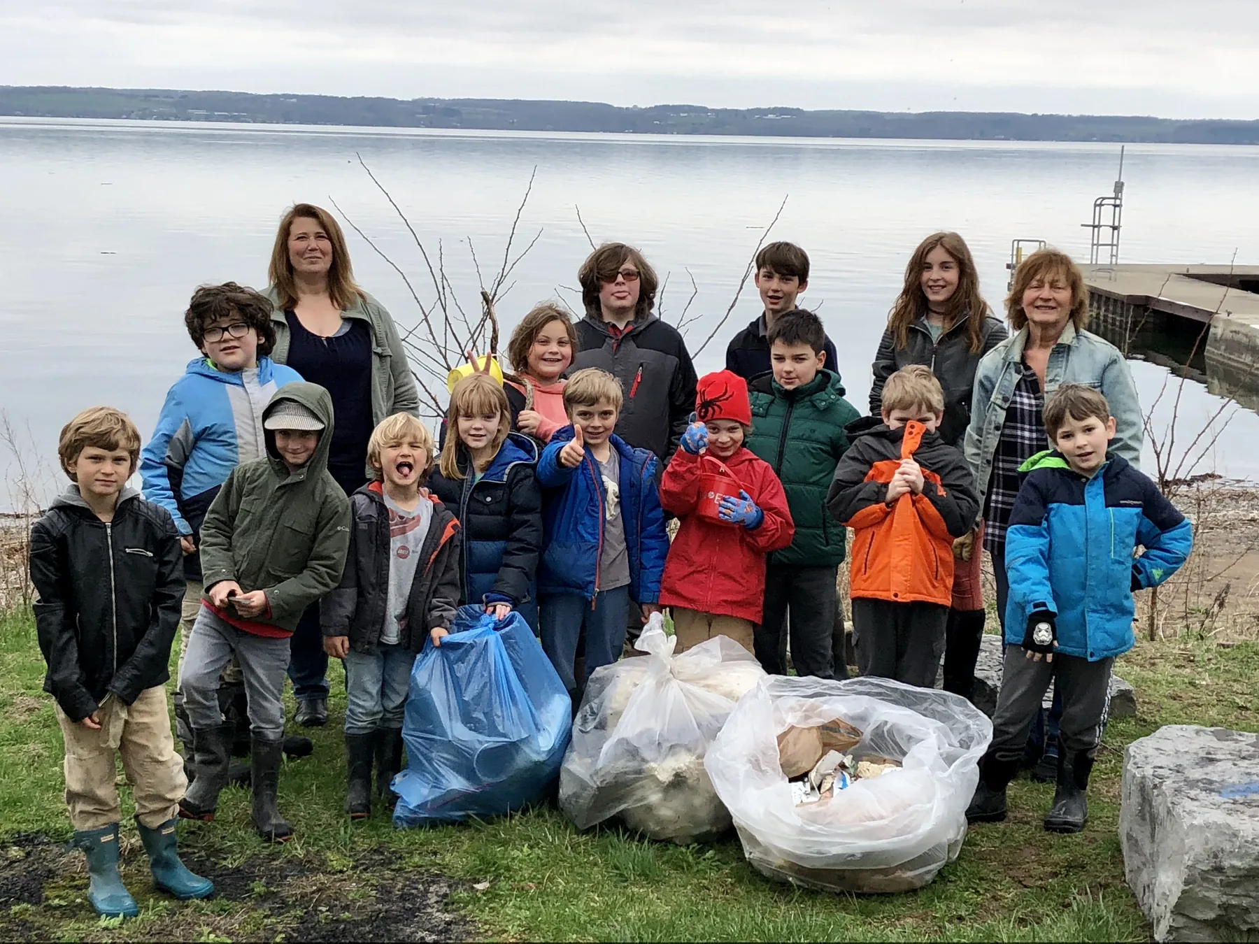 Peachtown students and teachers gathered on the shore of Cayuga Lake during an Earth Day clean-up.